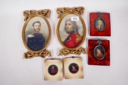 Two oval portrait prints of men in uniform, 4½" x 6½", in gilt decorated ribbon frames, together