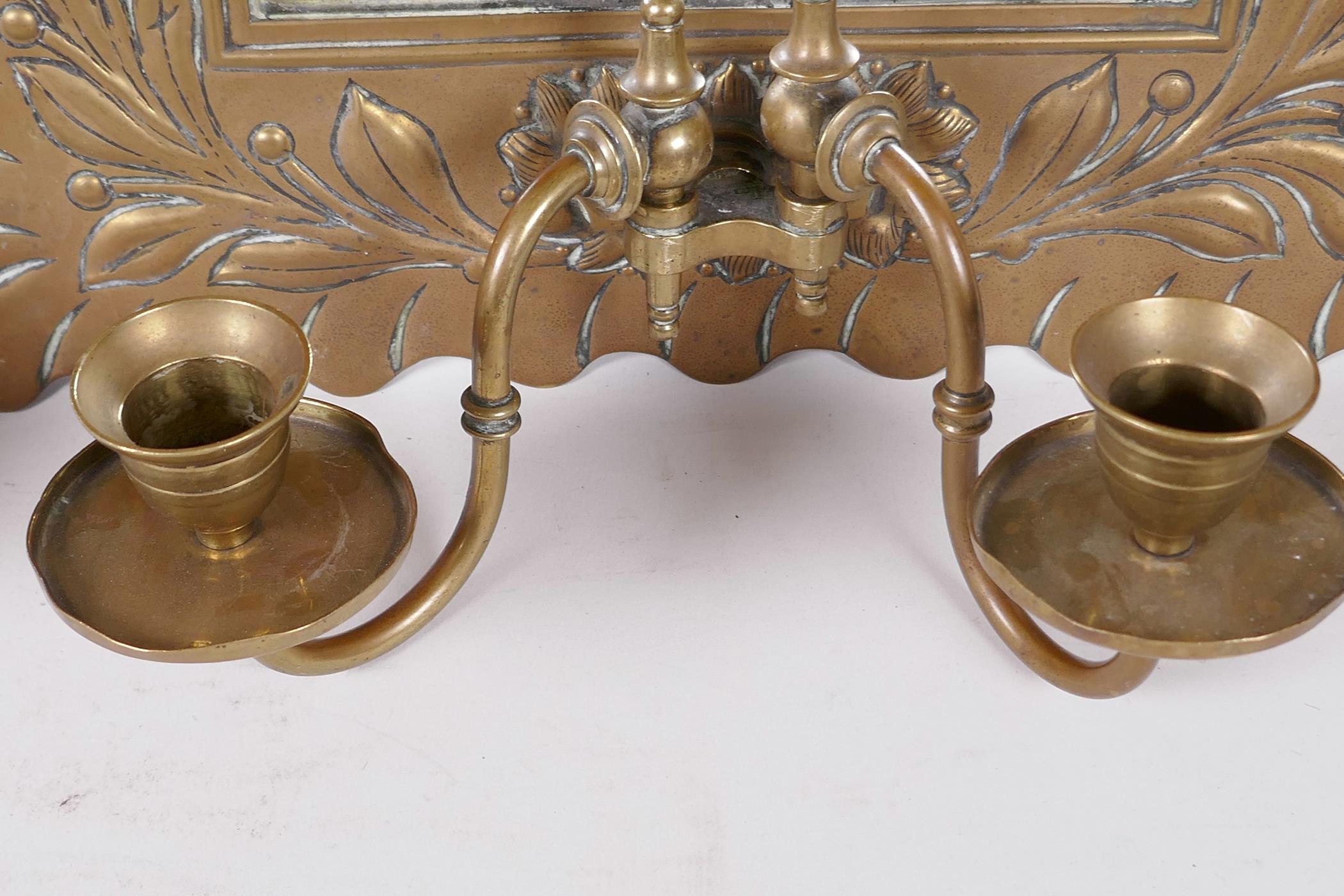 A pair of C19th pressed brass framed pier glass wall mirrors with twin candle sconces, the frames - Image 5 of 7