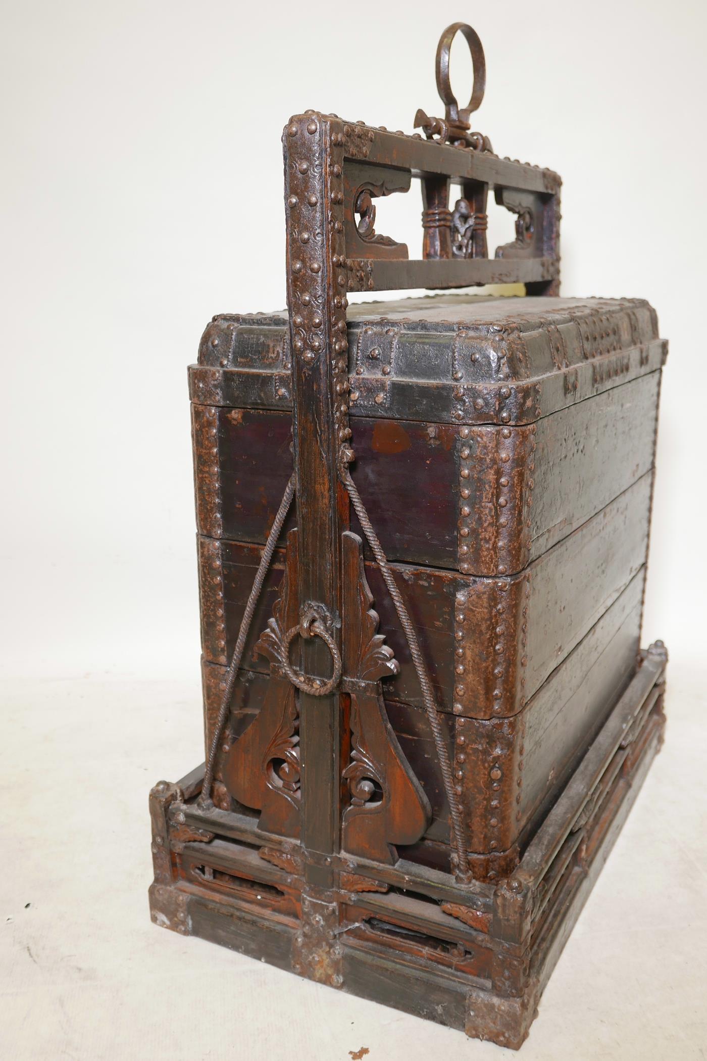 A C19th Chinese lacquered wood four section food box, with studded metal mounts and carrying case - Image 2 of 4