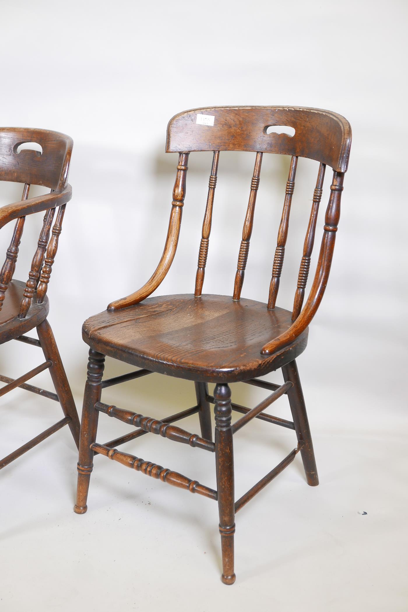 A near pair of C19th elm spindle back smoker's armchairs, and a similar pair of dining chairs, - Image 4 of 4