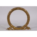 An ormolu frame in the form of a laurel wreath, 5" diameter