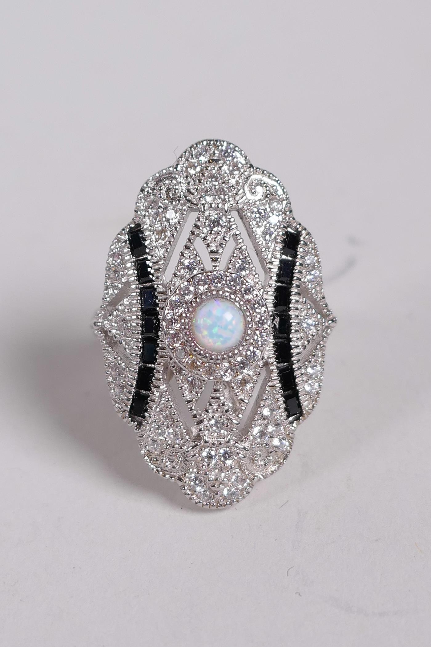 An Art Deco style 925 silver, cubic zirconium, sapphire and opalite set dress ring, approximate size