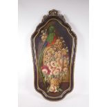 A decorative hanging wall panel, painted with a parrot, 33" high