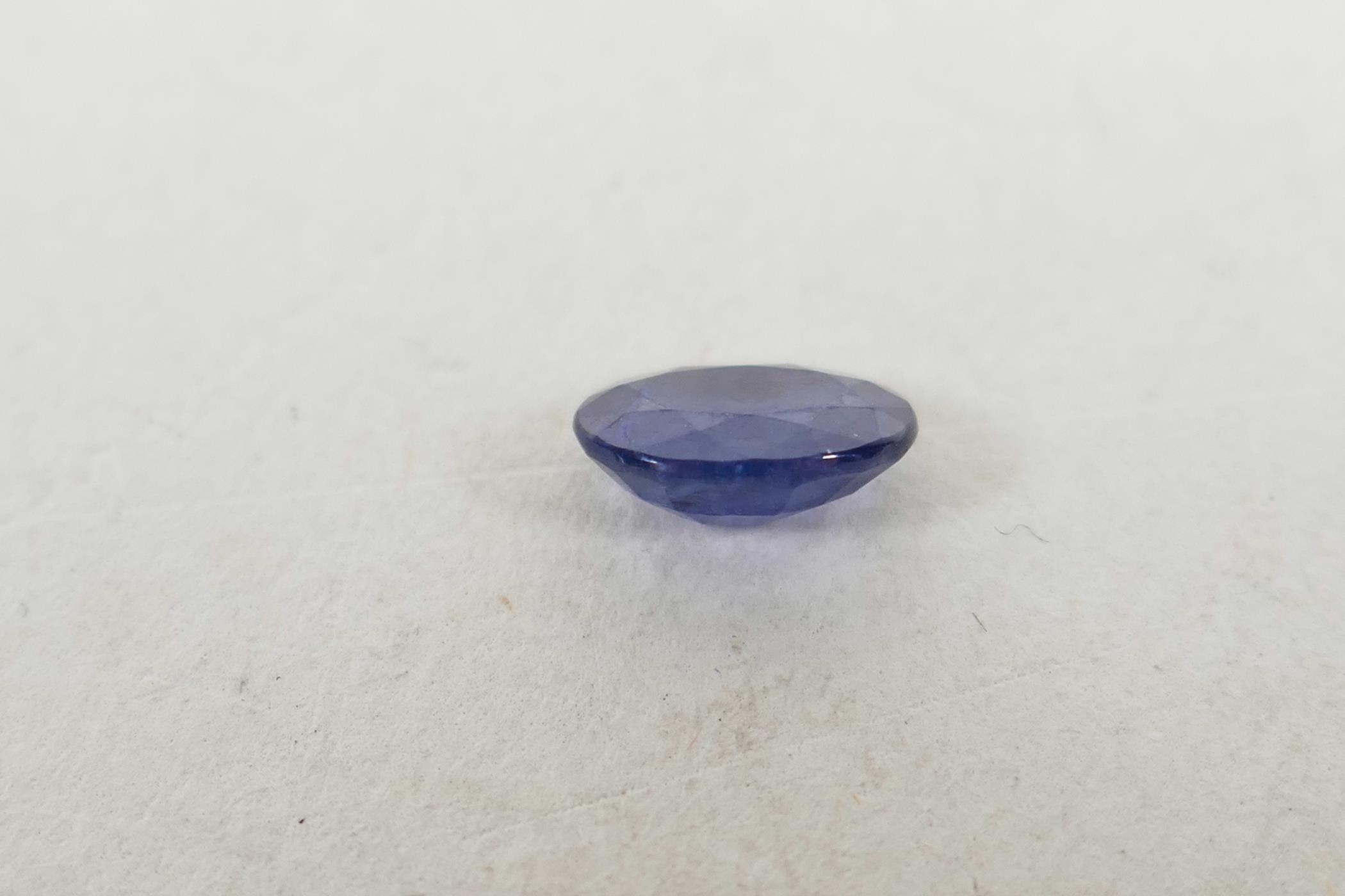 A 1.06ct blue sapphire, oval mixed cut, ITLGR certified, with certificate - Image 2 of 7