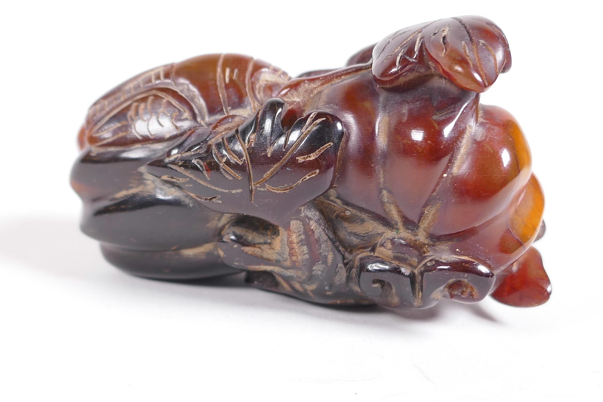 A Chinese carved horn ornament in the form of a cicada on a gourd, 2½" long - Image 2 of 4