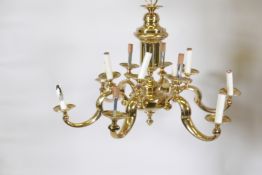 A six branch, twelve sconce brass chandelier, 30" x 22"