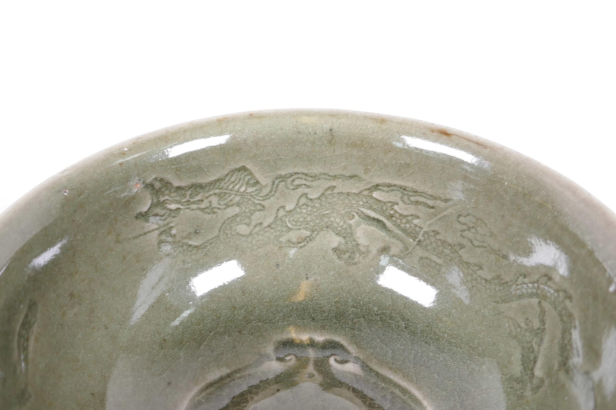 A Chinese dark green jade celadon stem cup decorated with dragons and fish, 5" high - Image 3 of 4