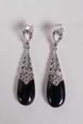 A pair of 925 silver and onyx drop earrings set with marcasite, 1½" drop