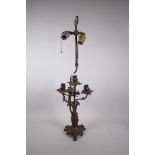 A brass rococo style four branch table lamp, 28" high