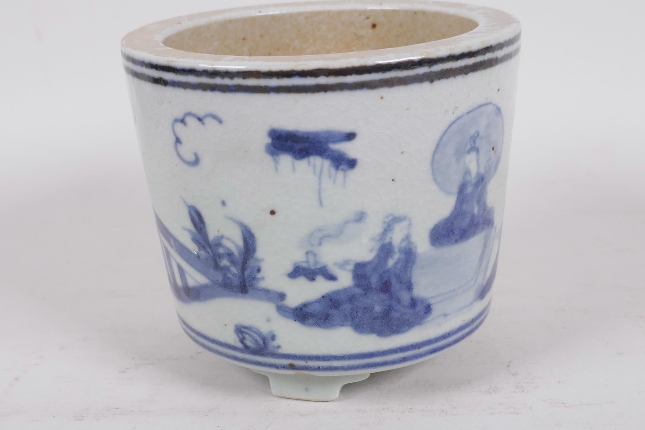 A squat Chinese blue and white porcelain cylindrical base on three feet decorated with figures in - Image 3 of 4