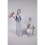 Two Lladro figurines, 'Girl with Parasol' 13" high, and girl and child seated on a bench with basket