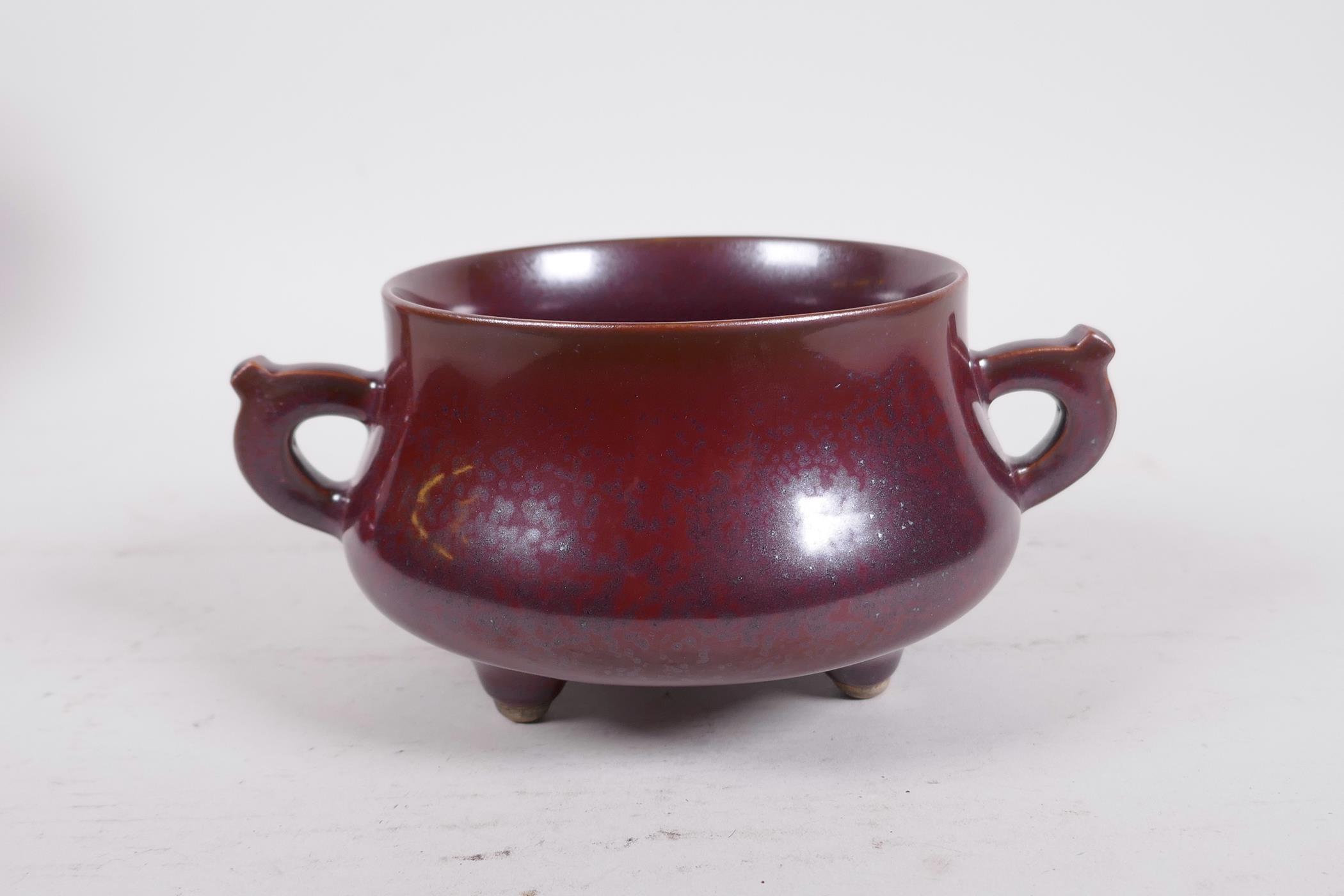 A Chinese iridescent copper glazed porcelain censer raised on tripod supports with two handles, - Image 3 of 7