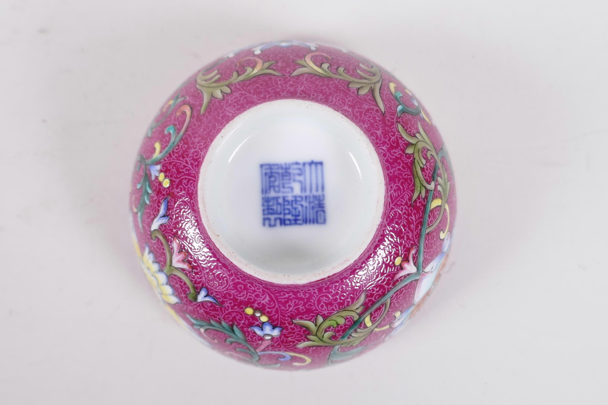 A Chinese polychrome porcelain tea bowl, with enamel lotus flower decoration on a pink ground, - Image 5 of 6