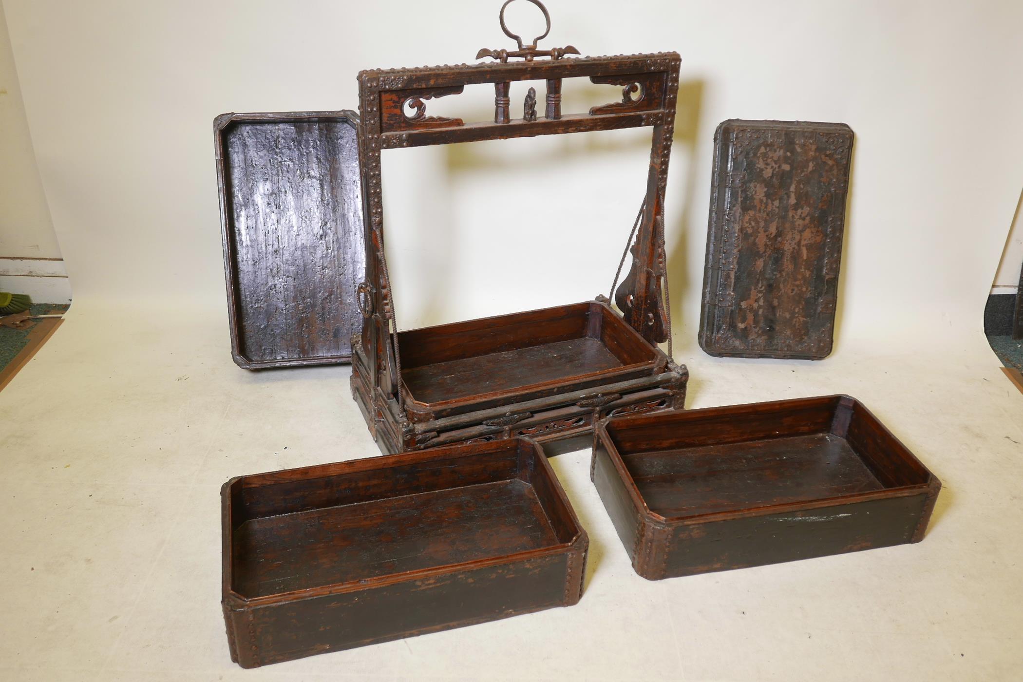 A C19th Chinese lacquered wood four section food box, with studded metal mounts and carrying case - Image 4 of 4