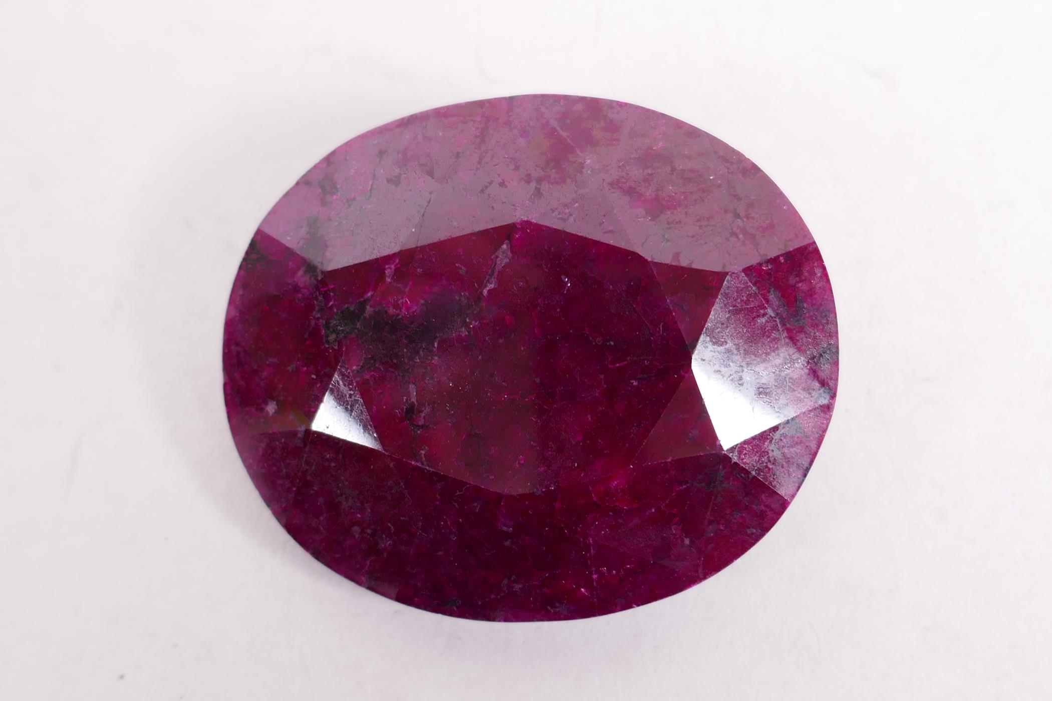A 295ct natural ruby gemstone, oval cut, with certification from the Gemological Laboratory of India - Image 2 of 6
