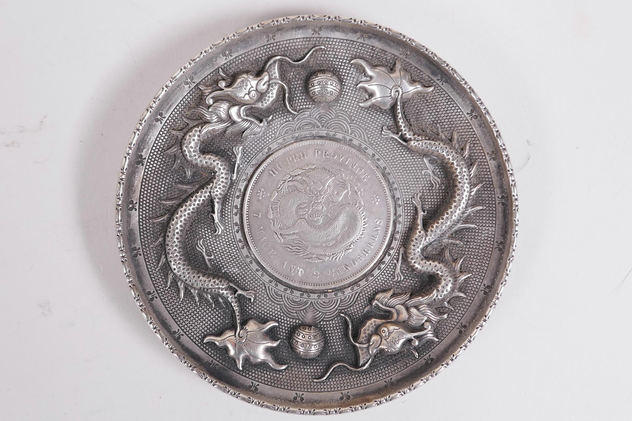 A Chinese white metal coin dish with raised dragon decoration, and another with bamboo decoration, - Image 2 of 5