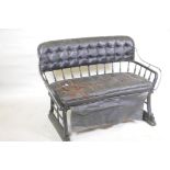 A 'Surrey' horse carriage set, with buttoned back and cushion, 42" wide, 31" high