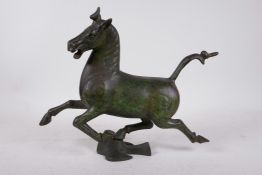 A Chinese Song style patinated bronze figure of a flying horse, 13" x 11" high