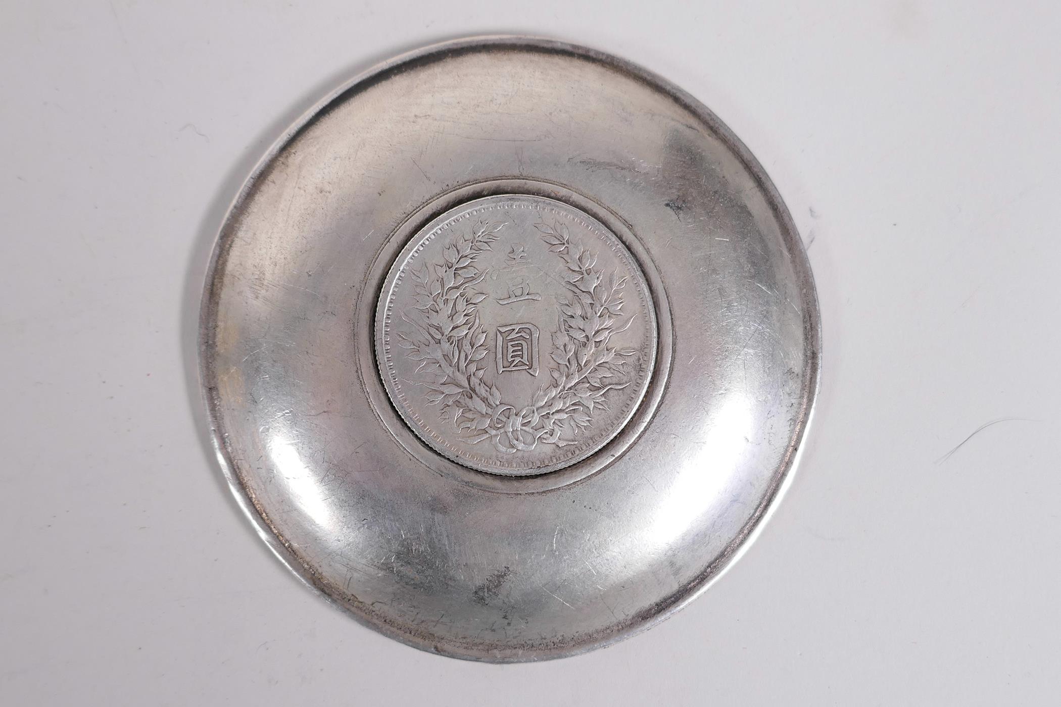 A Chinese white metal coin dish with raised dragon decoration, and another with bamboo decoration, - Image 5 of 5