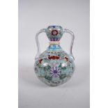 A Chinese polychrome porcelain garlic head shaped flask with two handles, and decorated with bats,
