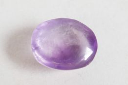 A 25.37ct amethyst oval cabochon, IDT certified, with certificate