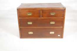 A mid century mahogany chest of two over two drawers, with military style brass handles, 19" x 36" x