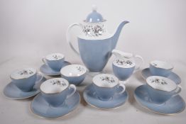 A Royal Doulton 'Rose Elegans' six place coffee set