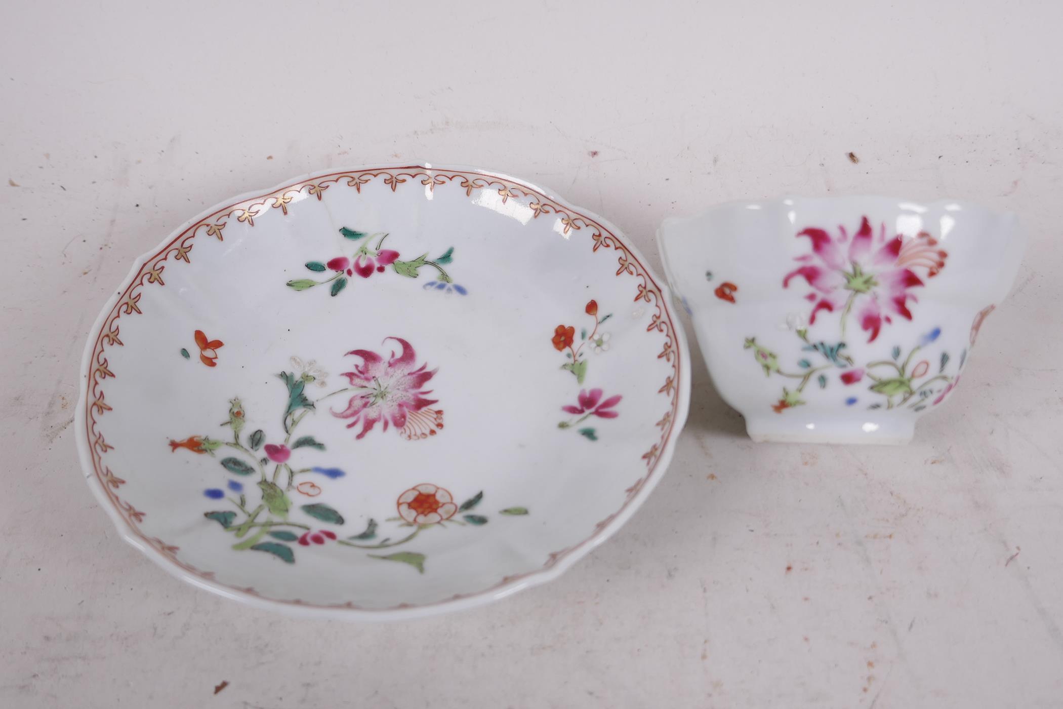 A Chinese export Yongzheng period famille rose tea bowl and saucer, delicately enamelled floral