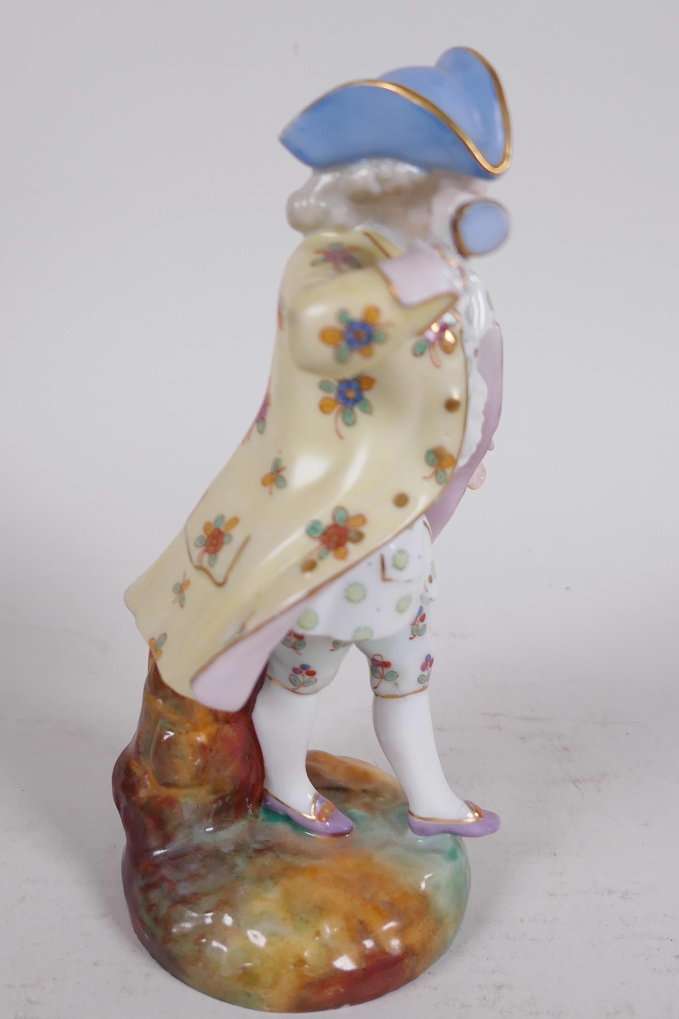 A Continental porcelain figure of a dandy with tricorn hat and spyglass, 5½" high - Image 3 of 4