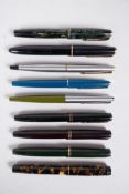 A collection of assorted Parker fountain pens to include three Parker 45's, two 65's, two 180's, a