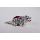 A sterling silver pincushion in the form of a beaver, 2" long