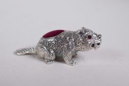 A sterling silver pincushion in the form of a beaver, 2" long