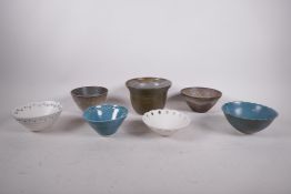 A collection of seven studio pottery bowls, signed SMH, largest 4" high