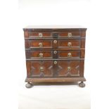 A William and Mary oak chest of four graduated panelled drawers, raised on bun feet, 37" x 23½", 37"