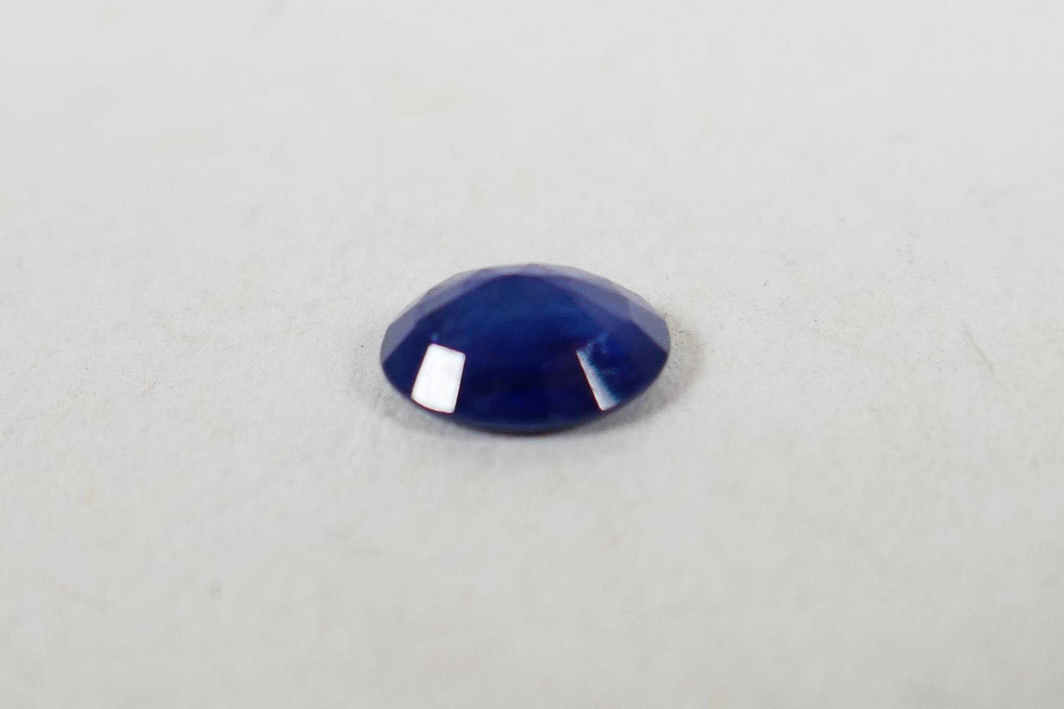 A 1.06ct blue sapphire, oval mixed cut, ITLGR certified, with certificate - Image 3 of 7