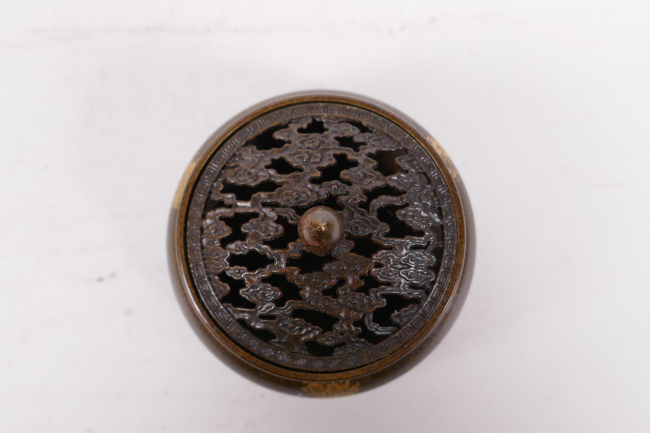 A Chinese bronze censer and cover on tripod supports, with gilt splash decoration, 6 character - Image 2 of 4