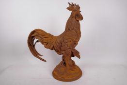 A cast iron garden figure of a rooster, 16½" high