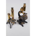 An early brass and iron monocular microscope by E. Leitz Wetzlar no. 185907, 12" high, together with
