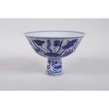 A Chinese blue and white porcelain stem bowl with carp in a lotus pond, 6 character mark to bowl, 4"
