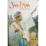 A Jimi Hendrix at Woodstock poster from the film of the same name, together with The Who's