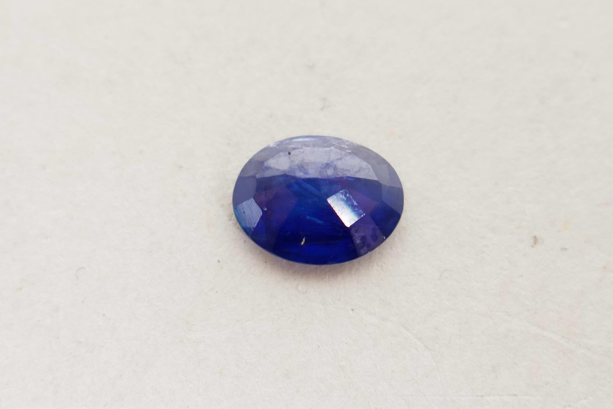 A 1.06ct blue sapphire, oval mixed cut, ITLGR certified, with certificate - Image 5 of 7