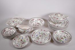 An Indian Tree part dinner service including tureens, dinner, cake and side plates, bowls etc, A/F