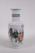 A Chinese famille verte porcelain Rouleau vase decorated with warriors in a landscape, 6 character