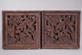 A pair of decorative pierced composition panels depicting birds and flowers, 15" x 15"