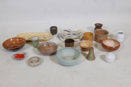 A collection of 18 studio pottery jars, bowls etc, most signed SMH, largest 7" diameter