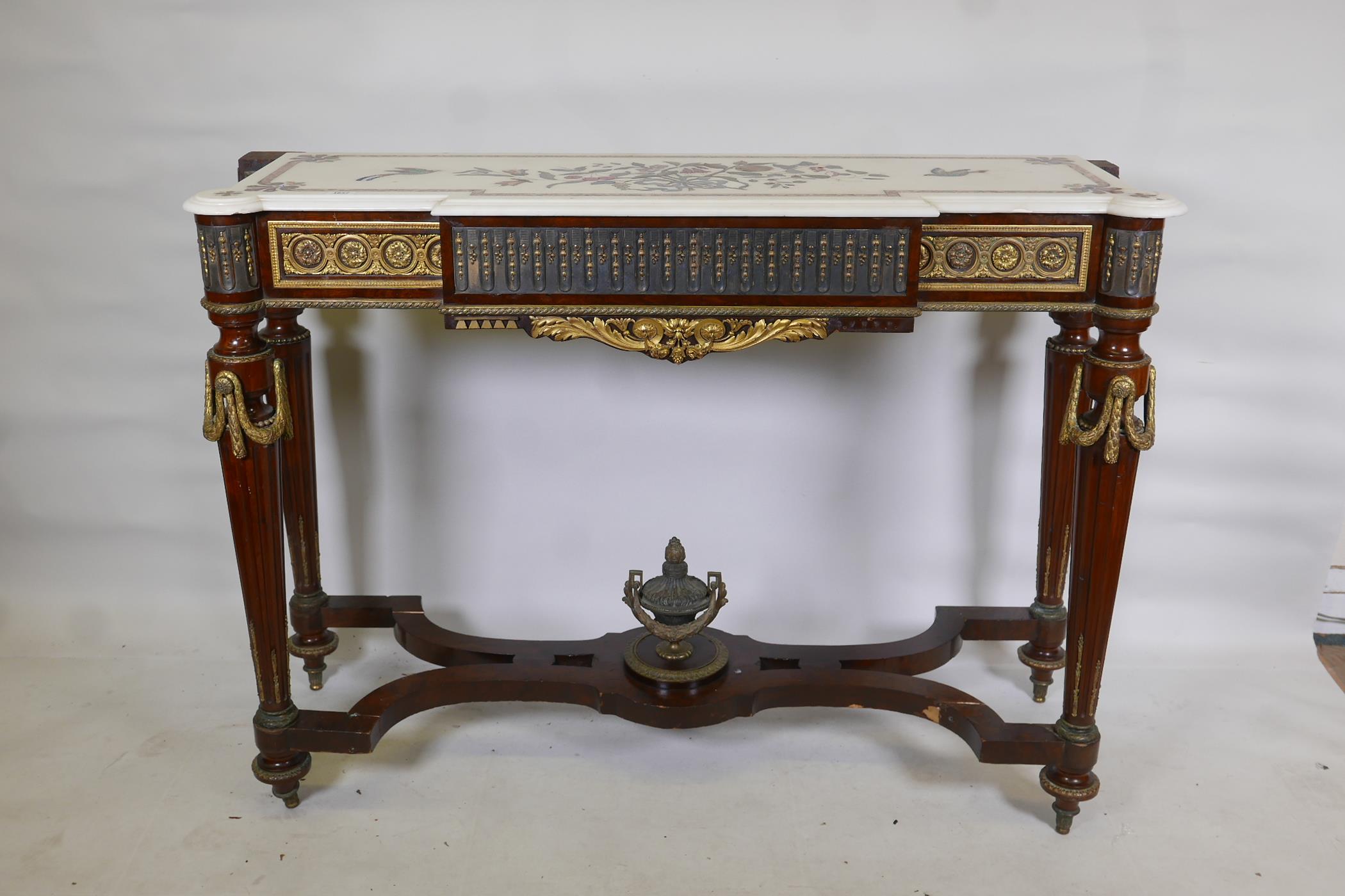 A neo-classical style breakfront mahogany and brass mounted console table, with inset frieze panels,