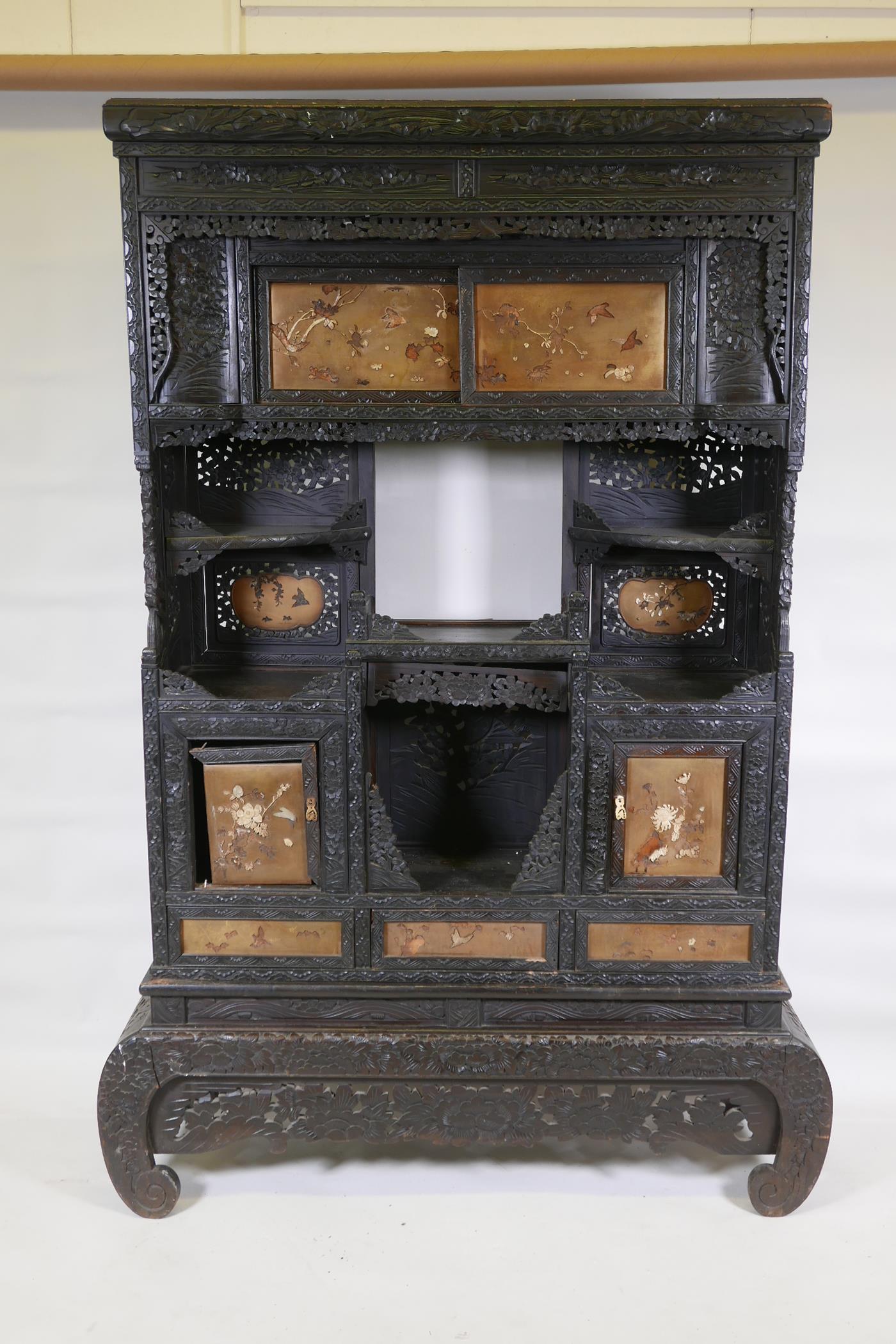 A Japanese Meiji period (1868-1912) two section shodhana, with carved decoration and inlaid