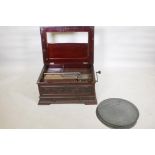 A C19th Stella polyphon, no. 675, in a mahogany case complete with 28 discs, including Bizet,