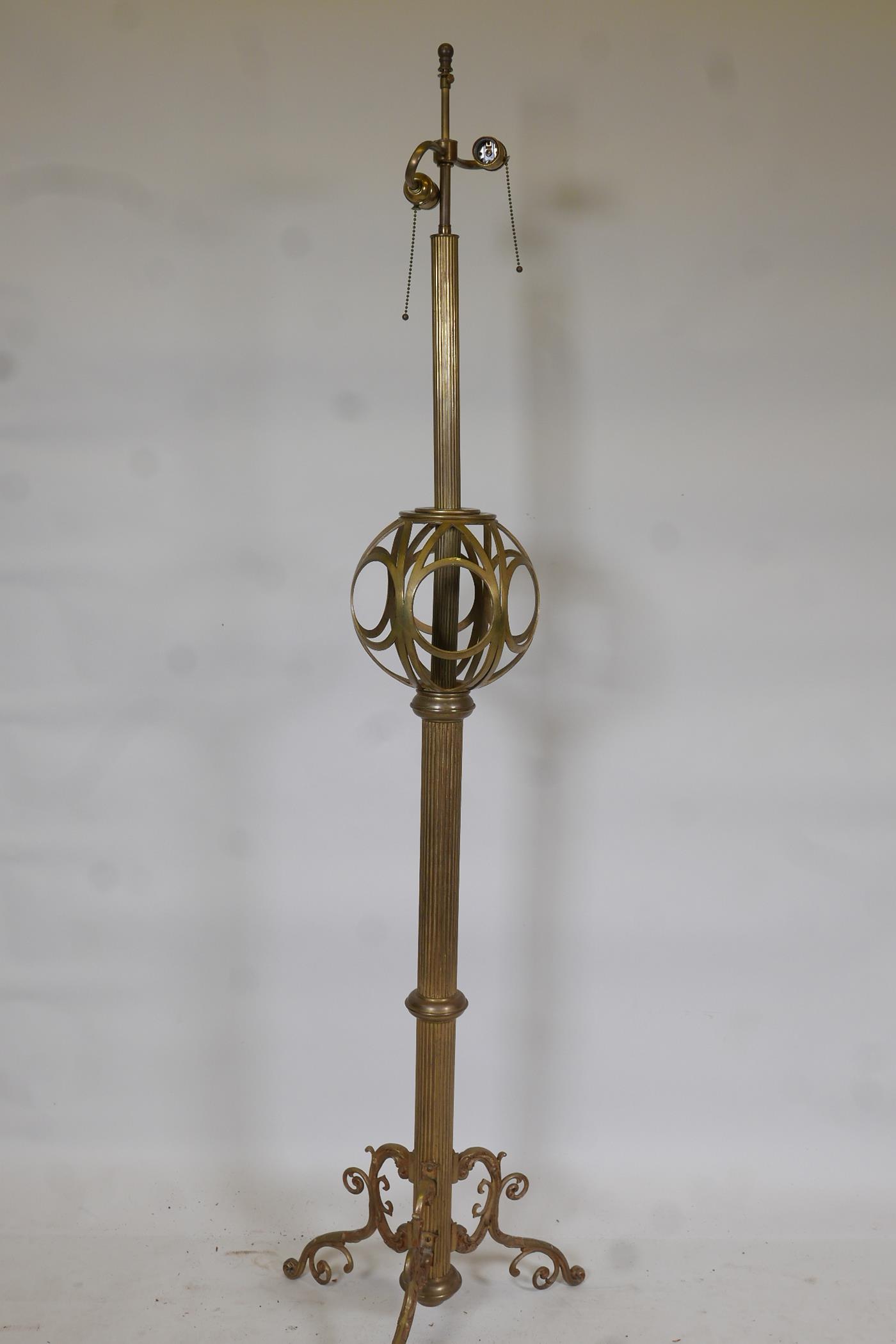 A brass floor lamp with fluted column and pierced globe decoration, 65" high - Image 2 of 2
