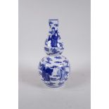 A Chinese blue and white porcelain double gourd vase decorated with the Eight Immortals, 4 character